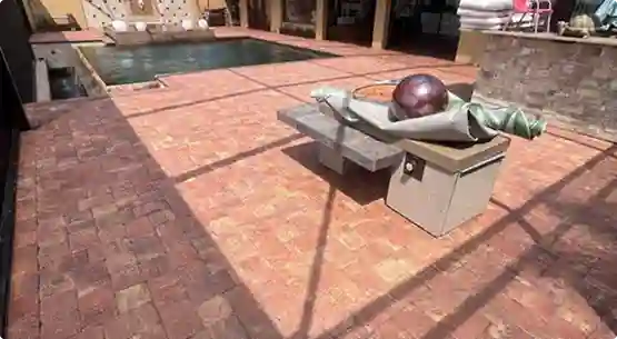 Worn and faded paver driveway before sealing service by Surface Shield in Punta Gorda, Florida